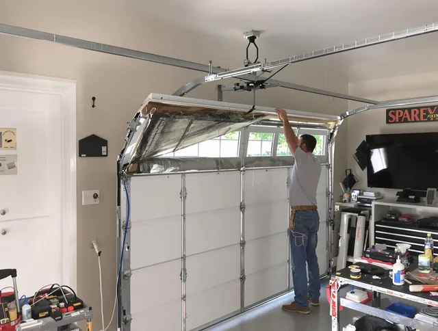 Garage door section replacement by North Reading Garage Door Repair in North Reading