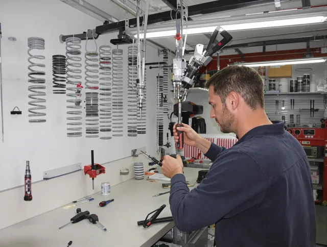 North Reading Garage Door Repair safety certified technician performing precision spring replacement in North Reading