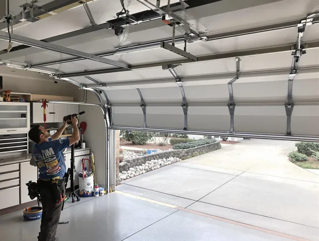 Garage door track repair service by North Reading Garage Door Repair in North Reading
